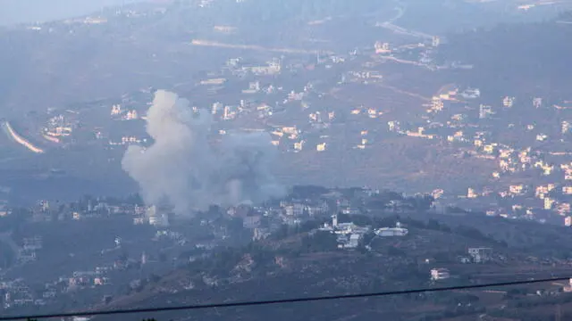 epa11620192 Smoke billows from the site of an Israeli airstrike that targeted Lebanese villages, as seen from Marjaayoun, southern Lebanon, early 23 September 2024. According to the Lebanese National News Agency (NNA), Israeli aircraft have reportedly carried out a number of bombings on communities in the Marjayoun district in the Nabatieh Governorate of Lebanon, including Taybeh, Houla, Tallouseh, Kfarkela, Mays al-Jabal, Khiyam, and Bani Hayan. The Israeli military urged, on 23 September 2024, civilians in areas where Hezbollah operates in Lebanon to leave, saying that they are conducting 'extensive airstrikes.' EPA/STR