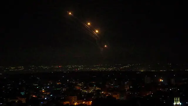 epa10562628 Israeli Iron Dome anti-missile system intercepts rockets launched from the Gaza Strip, as seen from the central Gaza City, 07 April 2023. The Israeli military launched airstrikes in the Gaza Strip amid tension arising from an incident at the Al-Aqsa mosque in Jerusalem, during which Israeli security forces confronted Palestinian worshipers gathered for Ramadan prayer services. According to the Israeli military, some 34 rockets were fired from Lebanon in the wake of the incident at Al-Aqsa mosque. According to statemets from an official from the organization Hamas, the rocket attacks coincided with Hamas leader Ismail Haniyeh's visit to Lebanon. The Israeli military retaliated with airstrikes in Gaza, targeting sites allegedly affiliated with Hamas, the organization that controls the Gaza Strip. Hamas denies responsibility for the rocket fire from Lebanon. EPA/MOHAMMED SABER