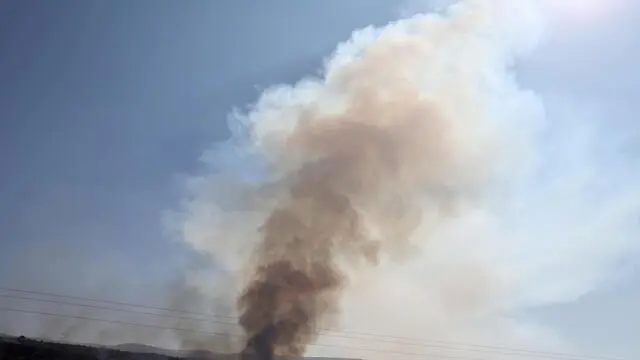 epa11654442 Smoke billows as a result of rocket fire from southern Lebanon into northern Israel, 11 October 2024. Israeli military reported that more army brigades and additional forces are joining the limited, localized, targeted raids on Hezbollah targets and infrastructure in southern Lebanon in the operation that started on 07 October. EPA/ATEF SAFADI