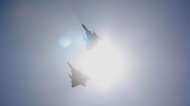 epa11657895 Taiwan Air Force Mirage 2000 fighter jets maneuver in the sky above the airbase in Hsinchu, Taiwan, 14 October 2024. China announced on 14 October that it will conduct the 'Joint Sword-2024B' military drills around Taiwan. EPA/RITCHIE B. TONGO