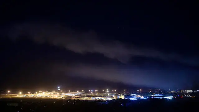 epa11649854 Smoke rises over Rafik Hariri International Airport as a result of an Israeli airstrike at Dahieh in the southern suburb of Beirut, Lebanon, 08 October 2024. According to the Lebanese Minister of Health, more than 2,100 people have been killed and more than 9,800 others have been injured in Lebanon since the beginning of the Israeli-Hezbollah conflict. Israel's military stated on 07 October, that the Israeli Air Force (IAF) has conducted 'extensive strikes' on Hezbollah targets in southern Lebanon. EPA/WAEL HAMZEH