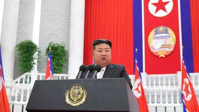 epa11595456 A photo released by the official North Korean Central News Agency (KCNA) shows North Korean leader Kim Jong Un delivering his speech on the 76th anniversary of the country’s founding in Pyongyang, North Korea, 09 September 2024 (issued 10 September 2024). According to KCNA, North Korean leader Kim Jong Un stated in his speech that the country will "steadily strengthen its nuclear force" to fully counter any threats posed by nuclear-armed rival states, and will intensify efforts to ensure that all of its armed forces, including the nuclear force, are combat-ready. EPA/KCNA EDITORIAL USE ONLY