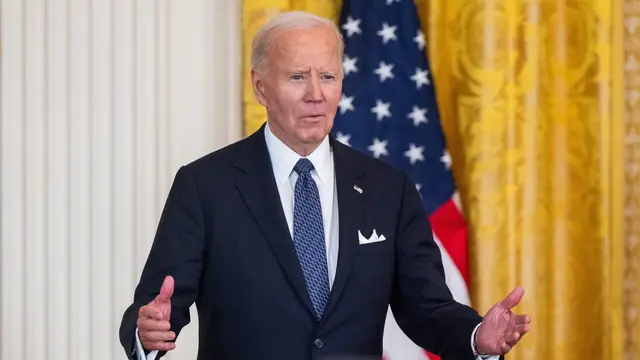 epa11663397 US President Joe Biden delivers remarks at an Italian American Heritage Month reception in the East Room of the White House in Washington, DC, USA, 16 October 2024. First Lady Dr. Jill Biden also attended the event, and spoke about her Italian heritage. EPA/JIM LO SCALZO