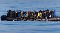 epa11202048 Around 60 migrants cross the English Channel on a small boat, on 06 March 2024. The UK government has suffered more setbacks at the House of Lords recently on its plan to send migrants to Rwanda to deter the Channel crossings. Despite the British and French government's efforts to prevent migrants from making the dangerous journey on small boats, many are willing to take the risk to claim asylum in the UK. EPA/TOLGA AKMEN