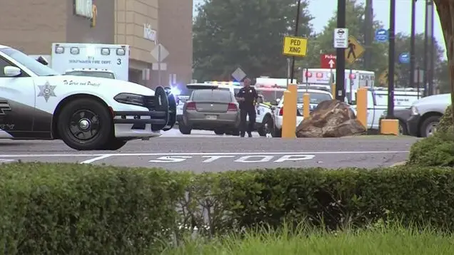 This still image provided by WATN-TV shows police and emergency personnel responding to a shooting at a Walmart in Southaven, Miss., on Tuesday, July 30, 2019. DeSoto County Sheriff Bill Rasco said that one person was killed and the suspect was shot. The shooting prompted a sizeable law enforcement response, with officers setting up a perimeter and entering the Walmart Supercenter. (WATN-TV via AP) . MANDATORY CREDIT