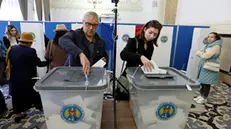 epa11671000 Moldovan citizens residing in Romania cast their ballots at a poling station located in downtown Bucharest, Romania, 20 October 2024. Moldova holds a presidential election and a referendum on whether to enshrine in the Constitution the country's path to EU membership on 20 October. EPA/ROBERT GHEMENT