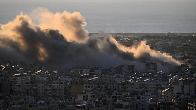 epa11669009 Smoke billows after an Israeli air strike on Dahieh, a southern suburb of Beirut, Lebanon, 19 October 2024. The Israeli army said the airstrikes were targeting Hezbollah weapons storage facilities. According to the Lebanese Ministry of Health, more than 2,400 people have been killed and over 11,200 others have been injured in Lebanon since the start of recent escalations of hostilities. EPA/STRINGER