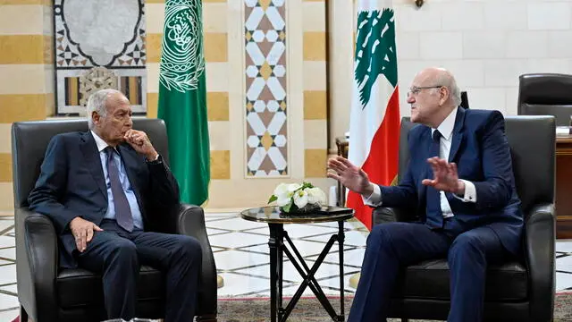 epa11672985 Lebanese caretaker Prime Minister Najib Mikati (R) meets with Secretary-General of the Arab League Ahmed Aboul Gheit (L) at the government palace in Beirut, Lebanon, 21 October 2024. Aboul Gheit is visiting Beirut on the same day as US special envoy Amos Hochstein is having talks with Lebanese officials on a ceasefire deal between Israel and Hezbollah. According to the Lebanese Ministry of Health, more than 2,460 people have been killed and over 11,500 others have been injured in Lebanon since the start of recent escalations of hostilities. EPA/WAEL HAMZEH