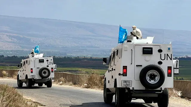 epa11606095 United Nations Interim Force (UNIFIL) vehicles patrol in Wazzani village, southern Lebanon, 15 September 2024. Displaced Syrian refugees, who used to work in agricultural fields in Wazzani village, are leaving the area after leaflets reportedly dropped by the Israel Defense Forces (IDF) demanded the evacuation of civilians from the Wazzani area and surroundings by 4pm local time due to Hezbollah activity in the area. The IDF did not immediately issue an official comment about the evacuation recommendation. EPA/STR