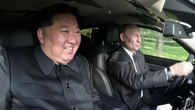 epa11424309 A photo released by the official North Korean Central News Agency (KCNA) on 20 June 2024, shows Russian President Vladimir Putin driving North Korean leader Kim Jong Un in an Aurus limousine in Pyongyang, North Korea 19 June 2024. The Russian president made a state visit to North Korea on 18-19 June at the invitation of North Korean leader. He last visited North Korea in 2000, shortly after his first inauguration as president. EPA/KCNA EDITORIAL USE ONLY EDITORIAL USE ONLY