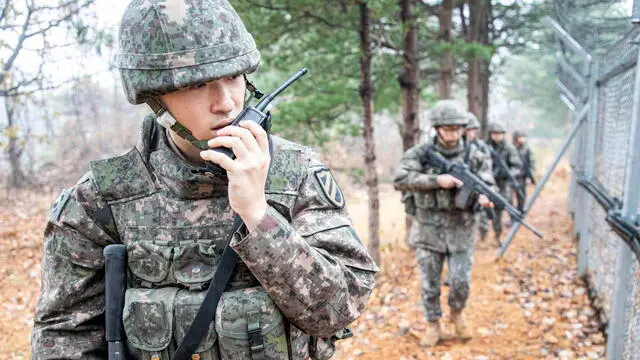 epa10997176 A handout photo made available by South Korean Army's 11th Infantry Division, shows soldiers of the divison based on the border with North Korea, conducting an anti-infiltration drill on 27 November 2023. According to a statement by South Korean military officials made on 27 November, North Korea deployed troops and equipment to Demilitarized Zone (DMZ) ground posts after the North vowed to resume all military measures halted under a 2018 deal. EPA/South Korean Army's 11th Infantry Division SOUTH KOREA OUT HANDOUT EDITORIAL USE ONLY/NO SALES HANDOUT EDITORIAL USE ONLY/NO SALES
