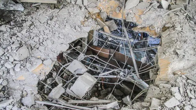 epa11617868 Internally displaced Palestinians search through the rubble in the Al-Zeitoun C school after an Israeli air strike in the Zaytoun area of Gaza City, 21 September 2024. According to the Palestinian Health Ministry in Gaza, at least 22 people were killed and dozens injured on 21 September after an Israeli strike hit a school in Gaza City which was being used as a shelter by internally displaced Palestinians. The Israeli Defense Forces (IDF) announced that the strike it conducted was targeting a Hamas control and command center, which was "embedded inside a compound that previously served as the Al Falah School." More than 41,300 Palestinians and over 1,400 Israelis have been killed, according to the Palestinian Health Ministry and the Israel Defense Forces (IDF), since Hamas militants launched an attack against Israel from the Gaza Strip on 07 October 2023, and the Israeli operations in Gaza and the West Bank which followed it. EPA/MAHMOUD ZAKI