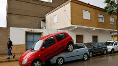 epa11690551 A view shows damaged cars following heavy rains in Llombai, Valencia, Spain, 29 October 2024. The State Meteorological Agency (AEMET) has activated red alerts for rain in various areas of the province of Valencia due to heavy rainfall caused by the storm DANA that is hitting several areas of Spain. EPA/ANA ESCOBAR