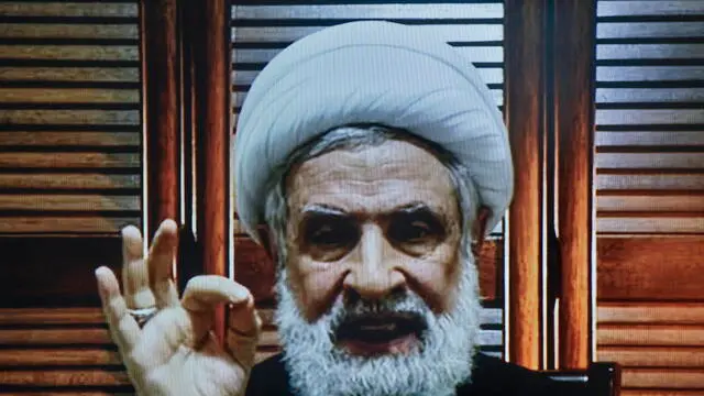 epa11633382 A handout screengrab taken from Hezbollah's Al Manar TV shows Hezbollah deputy leader Sheikh Naim Qassem delivering a televised address from an unknown location, days after Hezbollah leader Hassan Nasrallah was killed in an Israeli airstrike, 30 September 2024. According to the UN Humanitarian Coordinator in Lebanon, Imran Riza, the recent escalations in Lebanon have led to widespread destruction of homes and infrastructure across the country. At least 700 people have been killed, thousands have been injured, and nearly 120,000 people have been displaced in the past week. best quality availableHANDOUT EDITORIAL USE ONLY/NO SALES