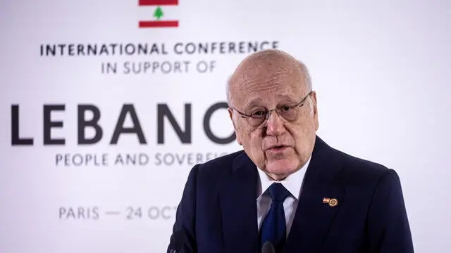 epa11680121 Lebanon's Prime Minister Najib Mikati speaks during a press conference at an international aid conference in support of Lebanon, in Paris, France, 24 October 2024. French President Macron said that his country would support Lebanon with 100 million euros as Paris hosts the aid conference 'International Conference in Support of Lebanon's People and Sovereignty'. EPA/CHRISTOPHE PETIT TESSON