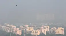 epa11689921 An aerial view of city during the engulfed heavy smog, in New Delhi, India, 29 October 2024. According to the Central Pollution Control Board (CPCB), Delhi and the National Capital Region's Air Quality Index (AQI) slipped into the severe and very poor category. EPA/RAJAT GUPTA