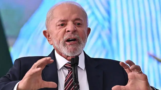 epa11662659 Brazilian President Luiz Inacio Lula da Silva speaks during the World Food Day ceremony at the Palacio do Planalto in Brasilia, Brazil, 16 October 2024. President Lula da Silva stated that 'nothing explains' that 733 million people in the world 'go to sleep every day without eating' and urged the international community to join the Alliance Against Hunger and Poverty. EPA/ANDRE BORGES