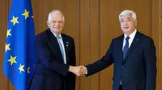 epa11695246 Japan's Defense Minister Gen Nakatani (R) shakes hands with EU High Representative for Foreign Affairs and Security Policy Josep Borrell prior to their meeting at the Defense Ministry in Tokyo, Japan, 01 November 2024. Borrell is traveling to Japan before heading to South Korea. EPA/FRANCK ROBICHON/POOL