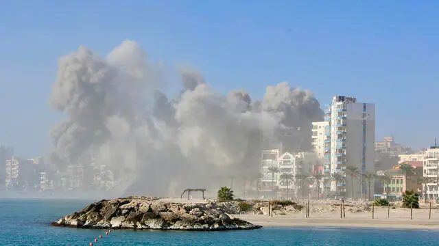 epaselect epa11688904 Smoke billows from an area after an Israeli airstrike, in Tyre, Lebanon, 28 October 2024. According to Lebanon's National News Agency (NNA), Israeli warplanes launched several airstrikes on Tyre. According to the Lebanese Ministry of Health, at least seven people were killed and 17 injured in an Israeli airstrike that targeted a building in Hay Ramel in Tyre. An Israeli spokesperson issued a warning to evacuate parts of Tyre earlier in the day. More than 2,650 people have been killed and over 12,400 others have been injured in Lebanon since the start of recent escalations of hostilities, the ministry stated. EPA/STRINGER