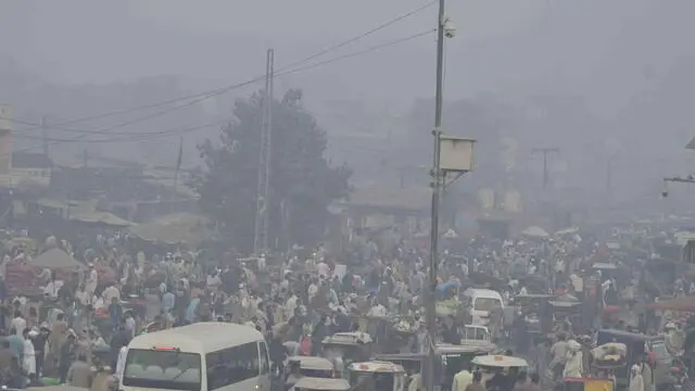 epa11690086 A view of thick smog in Lahore, Pakistan, 29 October 2024. In response to alarming air pollution levels in Lahore, where the air quality index (AQI) reached dangerous levels, new school timings have been implemented. Effective from 28 October, schools will start at 8:45 AM local time until 31 January 2025. Additionally, student assemblies will be held indoors, and all outdoor activities are suspended. A ban on fireworks has also been enforced. Residents are urged to wear masks, keep windows closed, and limit outdoor exposure to mitigate the health risks posed by smog, which is exacerbated during winter due to stagnant pollutants in the atmosphere. EPA/RAHAT DAR