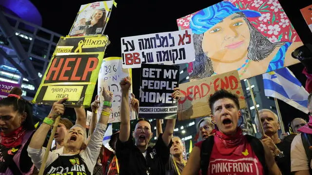 epa11685476 Relatives, friends and supporters of hostages held in Gaza by Hamas attend a protest calling for a ceasefire and for the release of hostages, near the Kirya in Tel Aviv, Israel, 26 October 2024. According to the Israeli army, around 100 Israeli hostages remain in captivity in the Gaza Strip since 07 October 2023, including bodies of 33 confirmed dead. EPA/ABIR SULTAN