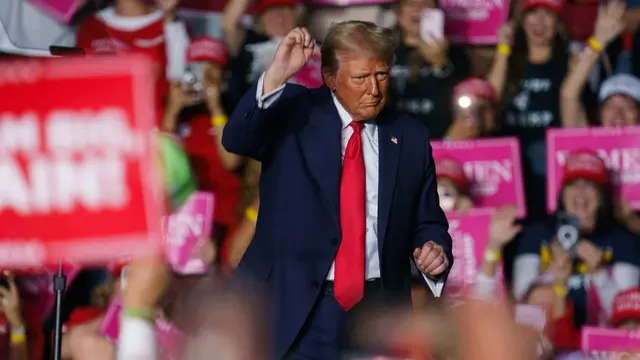 epa11701577 Former US President Donald Trump speaks at a rally in Reading, Pennsylvania, USA, 04 November 2024. Trump and US Vice President and Democratic presidential nominee Kamala Harris are tied in the polls with the US presidential election on 05 November. EPA/WILL OLIVER