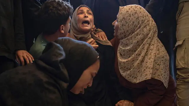 epa11699134 Family members mourn next to the bodies of their loved ones at Nasser Hospital following an Israeli airstrike that claimed the lives of at least eight people in Khan Yunis, southern Gaza Strip, 03 November 2024. More than 43,000 Palestinians and over 1,400 Israelis have been killed, according to the Palestinian Health Ministry and the Israel Defense Forces (IDF), since Hamas militants launched an attack against Israel from the Gaza Strip on 07 October 2023, and the Israeli operations in Gaza and the West Bank which followed it. EPA/HAITHAM IMAD