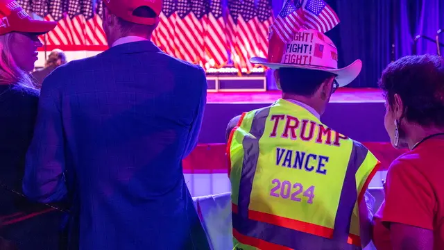 epa11704229 Supporters of former US president and Republican presidential candidate Donald Trump wait for results of the US 2024 presidential elections during an election night watch party held in the West Palm Beach Convention Center in West Palm Beach, Florida, USA, 05 November 2024. Voters across the country are casting ballots today for President of the United States in a tightly contested race between Republican presidential candidate Donald J. Trump and Democratic presidential candidate US Vice President Kamala Harris, as well as for candidates in congressional and local races. EPA/CRISTOBAL HERRERA-ULASHKEVICH