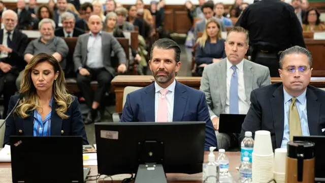 epa10953282 Donald Trump Jr. (C), son of former US President Donald J. Trump, appears at the ongoing civil fraud trial being litigated in New York, New York, USA, 01 November 2023. Donald Trump Jr, along with his father Donald Trump, his brother Eric and Trump family business entities, are facing a lawsuit by the State of New York accusing them of inflating the value of assets to get favorable loans from banks. EPA/SETH WENIG / POOL