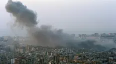 epaselect epa11705486 Smoke rises after an Israeli strike in the Dahieh district in Beirut, Lebanon, 06 November 2024. According to the Lebanese Ministry of Health, more than 3,000 people have been killed and over 13,400 others injured in Lebanon since the escalation in hostilities between Israel and Hezbollah. EPA/WAEL HAMZEH