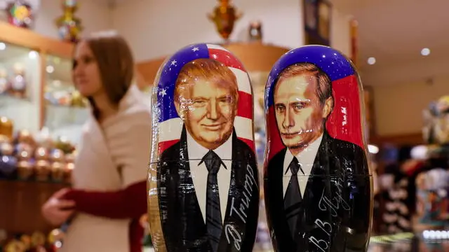 epa11704990 Traditional Russian Matryoshka wooden dolls, also known as nesting dolls, depicting US Republican presidential candidate Donald J. Trump (L) and Russian President Vladimir Putin (R), are on display at a gift shop in Moscow, Russia, 06 November 2024. US Republican presidential candidate Donald J. Trump has been elected the 47th president of the United States after having secured more than the 270 Electoral College votes necessary, following a tightly contested race with Democratic presidential candidate US Vice President Kamala Harris. EPA/YURI KOCHETKOV