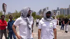 epa11518564 Men covering their heads with keffiyehs arrive to perform prayer at the Imam Abd al-Wahhab Mosque for the funeral ceremony of late Hamas leader Ismail Haniyeh, in Doha, Qatar, 02 August 2024. Haniyeh and one of his bodyguards were targeted and killed in Tehran on 31 July 2024, the Iranian Revolutionary Guard Corps (IRGC) confirmed. EPA/ABBAS ALI