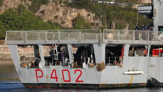 epa11709505 A group of migrants intercepted in international waters around Italy, arrive aboard the Italian Navy vessel Libra at Shengjin, Albania, 08 November 2024. Italy has sent a group of 8 migrants to Albania, after a previous group was turned away in October for failing the vetting process, in a plan aimed at deterring dangerous sea crossings by processing asylum claims outside the EU. The initiative faced legal setbacks after Italian courts ruled that migrants could not be held in Albania due to concerns over their legal status. In response, the Italian government adjusted the legal framework, hoping this would strengthen the policy, which allows up to 3,000 non-vulnerable men to be housed temporarily in Italian-run facilities in Albania. EPA/MALTON DIBRA