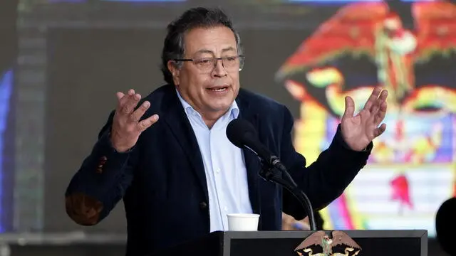 epa11614995 Colombian President Gustavo Petro speaks to a rally of supporters in Plaza Bolivar in Bogota, Colombia, 19 September 2024. Petro proposed lowering the retirement age since "life is not just about working, working, working," and proposed a global discussion around aging societies and the trend toward raising retirement ages. EPA/Mauricio Duenas Castaneda