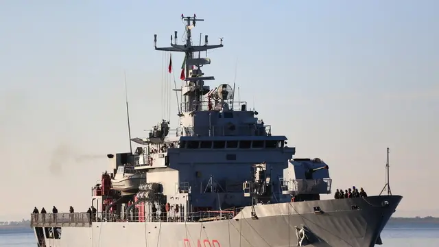 epa11709507 A group of migrants intercepted in international waters around Italy, arrive aboard the Italian Navy vessel Libra at Shengjin, Albania, 08 November 2024. Italy has sent a group of 8 migrants to Albania, after a previous group was turned away in October for failing the vetting process, in a plan aimed at deterring dangerous sea crossings by processing asylum claims outside the EU. The initiative faced legal setbacks after Italian courts ruled that migrants could not be held in Albania due to concerns over their legal status. In response, the Italian government adjusted the legal framework, hoping this would strengthen the policy, which allows up to 3,000 non-vulnerable men to be housed temporarily in Italian-run facilities in Albania. EPA/MALTON DIBRA