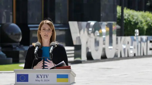 epa11329194 President of the European Parliament Roberta Metsola speaks during a joint press conference with Ukrainian President Volodymyr Zelensky (not pictured) in Kyiv, Ukraine, 09 May 2024. Metsola arrived in Kyiv to meet with top Ukrainian officials amid the ongoing Russian invasion. EPA/SERGEY DOLZHENKO