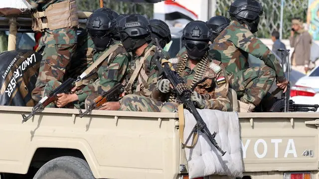 epa11629036 Houthi soldiers ride a vehicle while on patrol during a protest in solidarity with the Lebanese and Palestinian people in Sana'a, Yemen, 27 September 2024. Yemen's Houthis have claimed to have fired 23 ballistic and winged missiles and a drone at three US destroyers in the Red Sea, alleging that they were on their way to support Israel, in the context of the armed conflict between Israel and the Palestinian and Lebanese groups of Hamas and Hezbollah, according to a statement by Houthi military spokesman Yahya Sarea. This Houthi attack came a few hours after the Israeli military said they intercepted a surface-to-surface missile outside of Israeli territory that was launched from Yemen. EPA/YAHYA ARHAB