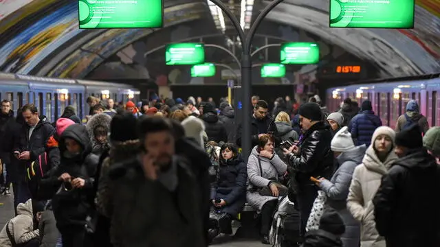 epaselect epa10368339 People shelter in a subway station during an air raid alert in Kyiv (Kiev), Ukraine, 16 December 2022. A wave of Russian missile attacks on 16 December targeted the Ukrainian capital Kyiv and other parts of the country. Russian troops on 24 February entered Ukrainian territory, starting a conflict that has provoked destruction and a humanitarian crisis. EPA/OLEG PETRASYUK