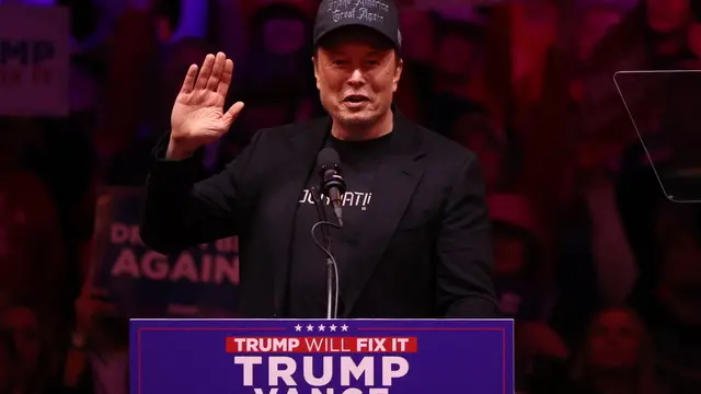 epa11688257 Elon Musk, businessman, gestures to the audience during a rally held for former US President and Republican presidential candidate Donald Trump, at Madison Square Garden in New York, New York, USA, 27 October 2024. Trump is facing US Vice President and Democratic presidential candidate Kamala Harris in the upcoming election on 05 November 2024. EPA/SARAH YENESEL