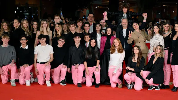 Italian director Margherita Ferri (C) with the cast arrive for the screening of the movie 'Il ragazzo dai pantaloni rosa' at the 19th annual Rome International Film Fest in Rome, Italy, 24 October 2024. The Festa del Cinema di Roma runs from 16 to 27 October 2024. ANSA/ETTORE FERRARI