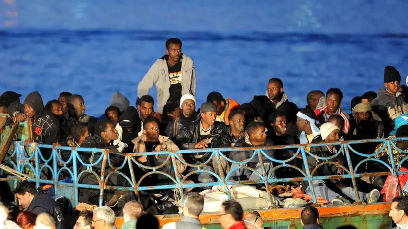 Uno sbarco a Lampedusa, foto d'archivio