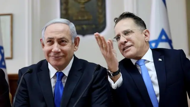 epa08003234 Israeli Prime Minister Benjamin Netanyahu (L) listens to Cabinet Secretary Tzachi Braverman at the start of the weekly cabinet meeting at his Jerusalem office, 17 November 2019. EPA/GALI TIBBON / POOL