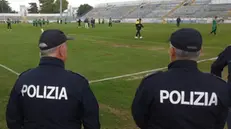 Due agenti della Polizia a bordo campo, nello stadio di Matera