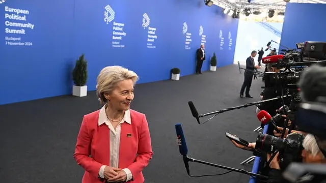 epa11706997 European Commission President Ursula von der Leyen talks to the press upon arrival to the 5th summit of the European Political Community (EPC) held in Puskas Arena in Budapest, Hungary, 07 November 2024. EPA/SZILARD KOSZTICSAK HUNGARY OUT