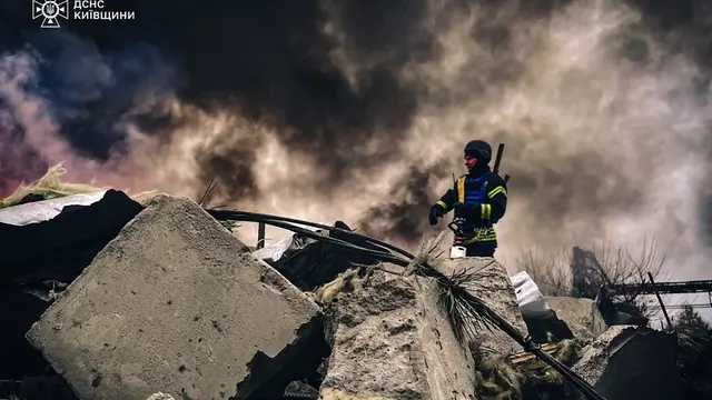 epa11717806 A handout photo made available by the State Emergency Service of Ukraine shows Ukrainian rescuers working at the site of a Russian attack on a building in the city of Brovary near Kyiv, Ukraine, 13 November 2024, amid the ongoing Russian invasion. At least one person was injured following a Russian overnight combined attack in Kyiv's area, according to the State Emergency Service of Ukraine (SESU). According to the Ukrainian Armed Forces, Russian troops launched an overnight attack with six rockets of different types and 90 'Shahed' unmanned aerial vehicles (UAVs) across Ukraine. EPA/SECURITY SERVICE OF UKRAINE HANDOUT HANDOUT EDITORIAL USE ONLY/NO SALES