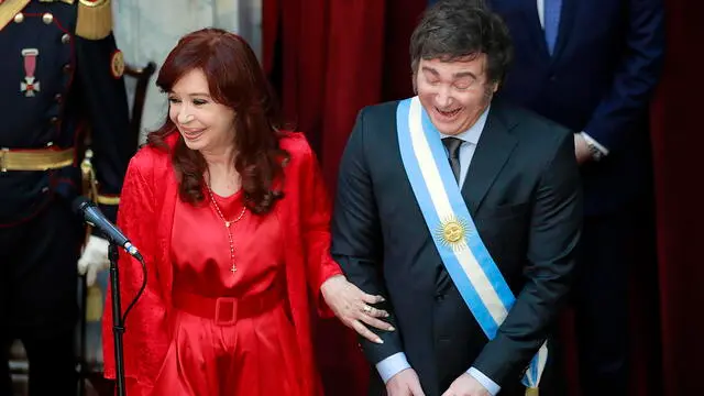 epa11021499 President of Argentina Javier Milei (R) is greeted by the outgoing vice president of Argentina Cristina Fernandez during the ceremony in the National Congress, Buenos Aires, Argentina, 10 December 2023. The far-right libertarian economist Milei will be sworn in at the National Congress to become president of the South American country for the period 2023-2027 after winning the runoff election on 19 November. EPA/Demian Alday Estevez