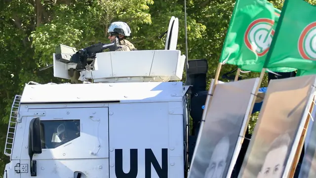 epa11680311 UNIFIL peacekeepers patrol near a Lebanese army checkpoint in Borj Rahal town, in the Tyre District, southern Lebanon, 24 October 2024. According to the Lebanese Ministry of Health, more than 2,500 people have been killed and over 12,000 others have been injured in Lebanon since the start of recent escalations of hostilities. EPA/STRINGER