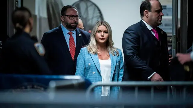 epa11377557 Karoline Leavitt (C) follows former President Donald Trump as they arrive for Trumpâ€™s criminal trial at the Manhattan Criminal Court in New York, NY, USA, 29 May 2024. Trump was charged with 34 counts of falsifying business records last year, which prosecutors say was an effort to hide a potential sex scandal, both before and after the 2016 presidential election. Trump is the first former U.S. president to face trial on criminal charges. EPA/JABIN BOTSFORD / POOL