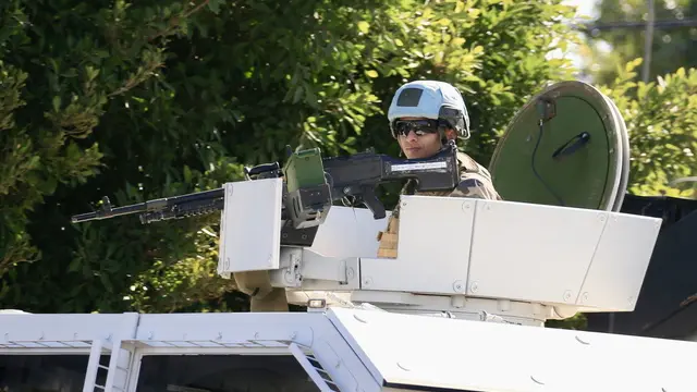 epa11680310 UNIFIL peacekeepers patrol near a Lebanese army checkpoint in Borj Rahal town, in the Tyre District, southern Lebanon, 24 October 2024. According to the Lebanese Ministry of Health, more than 2,500 people have been killed and over 12,000 others have been injured in Lebanon since the start of recent escalations of hostilities. EPA/STRINGER