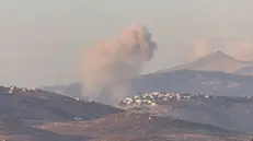 epa11726159 Smoke rises as a result of an Israeli airstrike on Al-Khiam village in southern Lebanon, as seen from the Israeli side of the border, northern Israel, 17 November 2024. The Israeli army reported that "the Haruv Reconnaissance Unit is operating in Southern Lebanon to remove threats to Israeli communities in Northern Israel". EPA/ATEF SAFADI